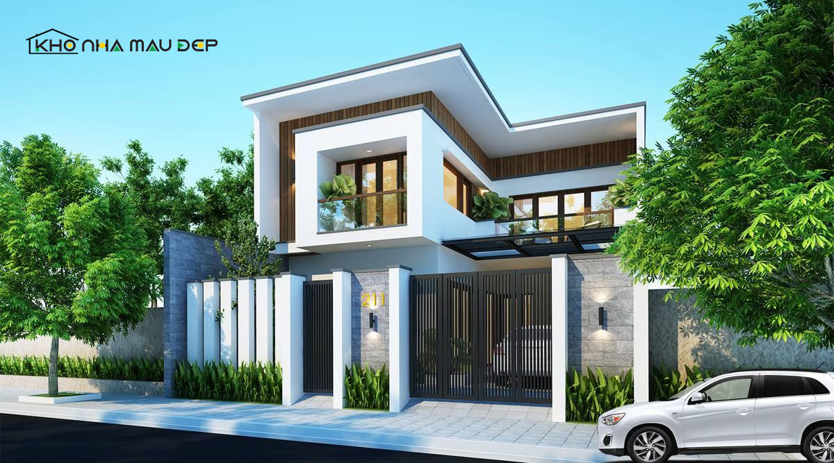 Góc chữ L của nhà mái bằng 2 tầng ở nông thôn được tận dụng làm chỗ đậu xe