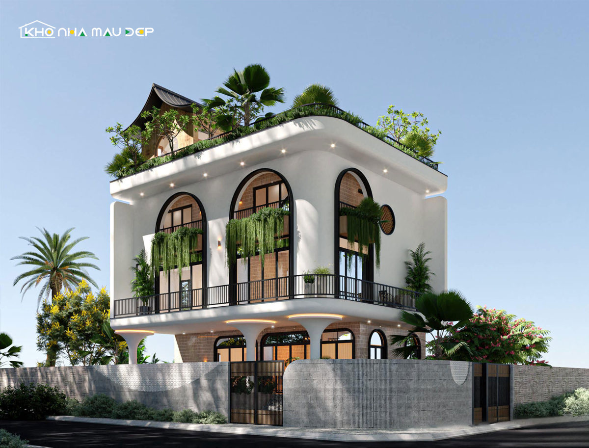 Mẫu nhà ống 2 mặt tiền 2 tầng thiết kế kết hợp nhiều mảng xanh giúp cân bằng lại tổng thể ngôi nhà