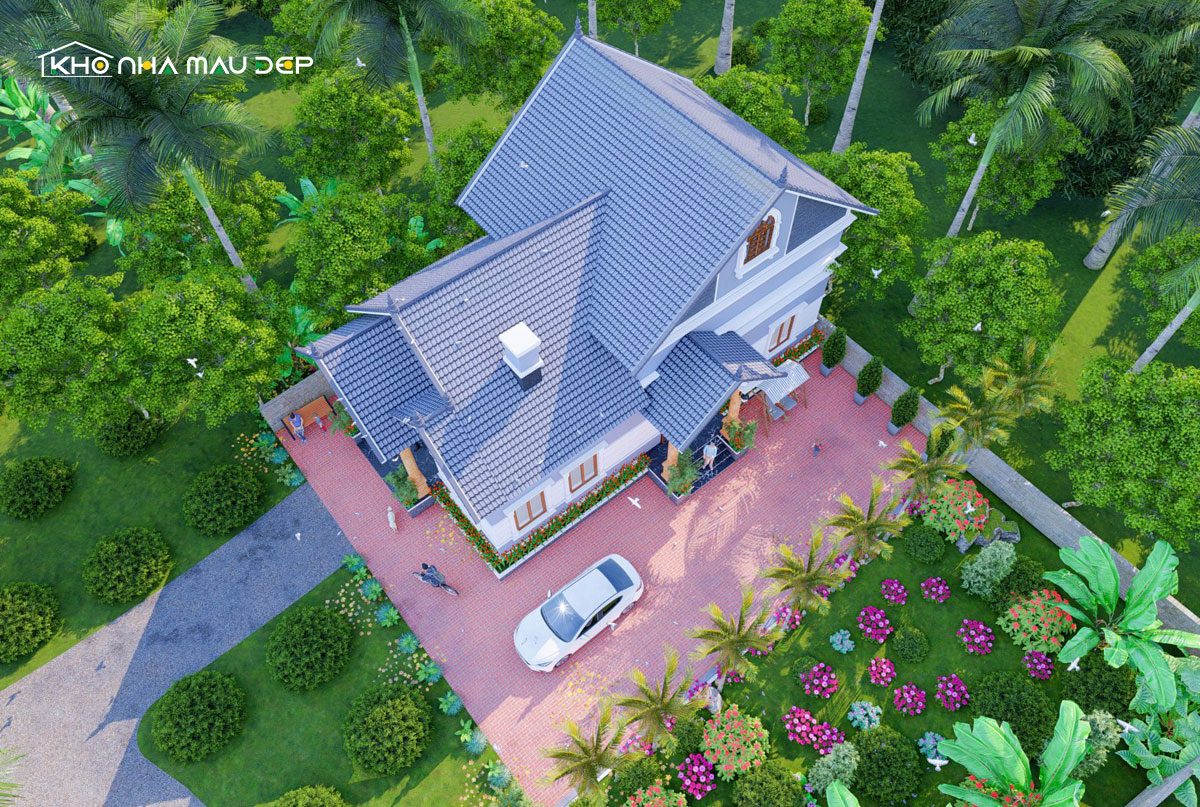 Sân vườn nhỏ trồng nhiều hoa trước nhà cấp 4 mái thái