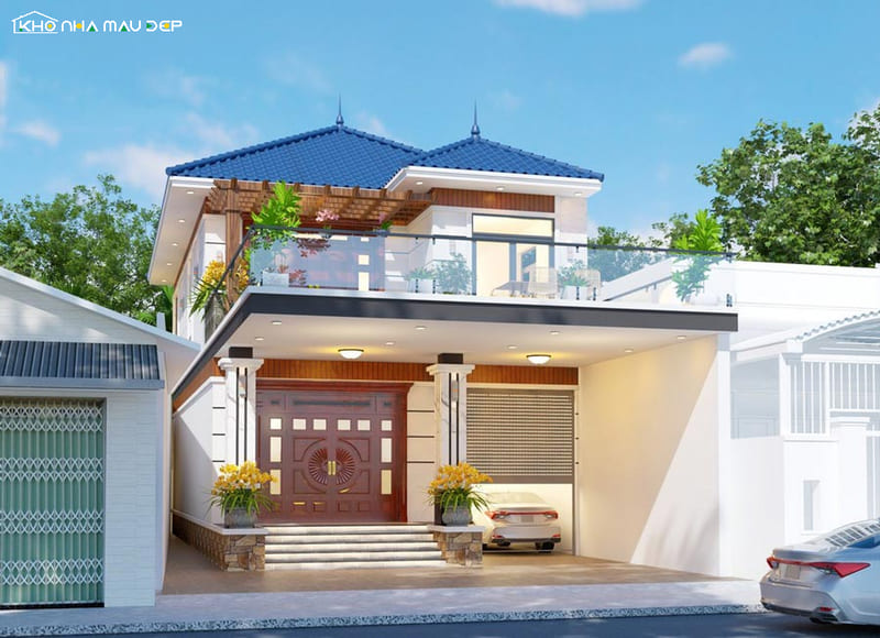 Mẫu nhà 2 tầng có gara tích hợp ngay trong khối nhà, ban công rộng cùng hệ mái dốc
